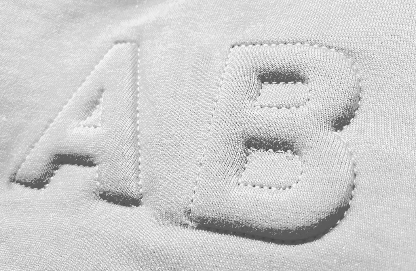 3D puff embroidery detail on Royal Air Force sweatshirt.